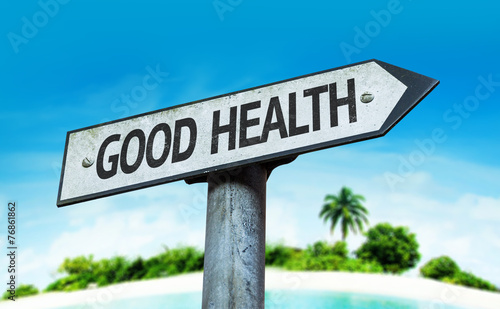 Good Health sign with a beach on background