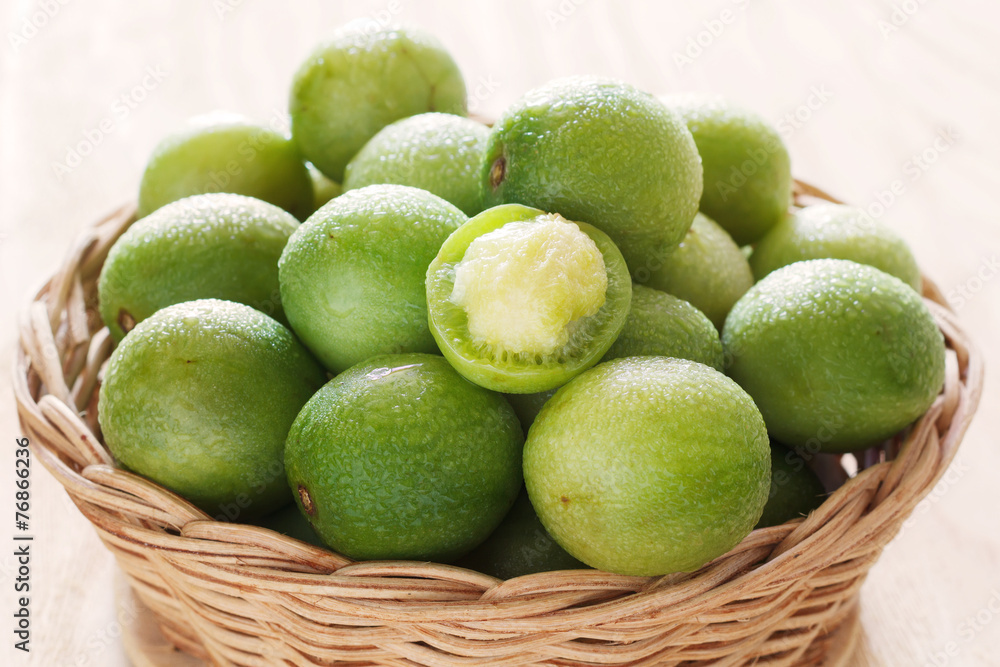 Close up brazilian fruit Spondias tuberosa (Brazil plum, imbu, u Close up brazilian fruit Spondias tuberosa (Brazil plum, imbu, u
