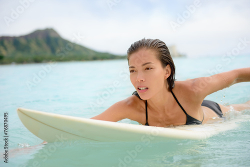 Photography Surfing surfer girl paddle for surf on surfboard