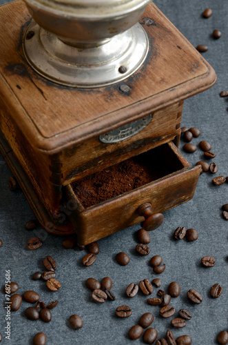 Coffee beans with vintage grinder