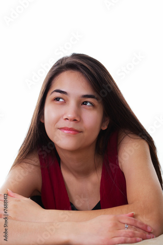 Slika na platnu Beautiful biracial teen girl looing up with happy, spunky expres
