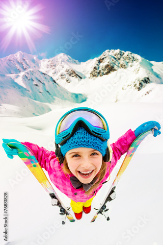 Ski, skier girl enjoying ski vacation, filtered