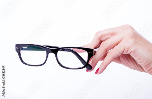 Woman hands holding glasses