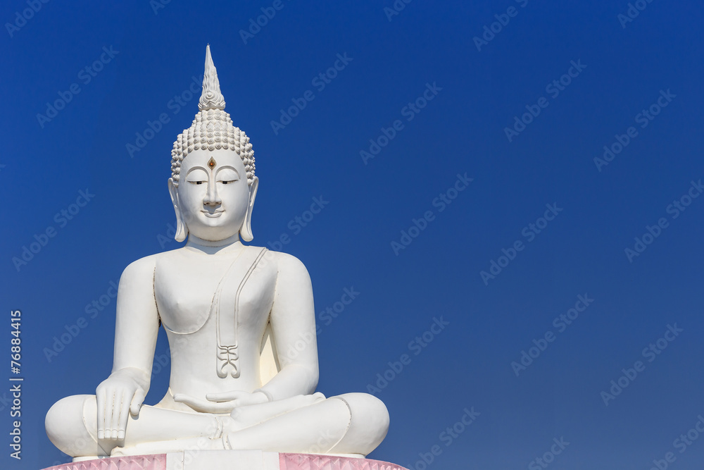 Big white buddha statue and blue sky in Thailand Big white buddha statue and blue sky in Thailand
