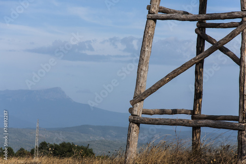 wooden watchtower in the mountains © ekaterinabrovi