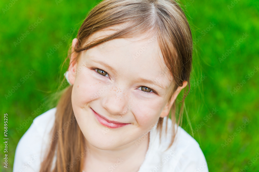 Summer close up portrait of a cute little girl of 6 years old Summer close up portrait of a cute little girl of 6 years old
