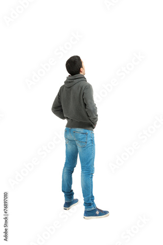 man standing on white seen from behind