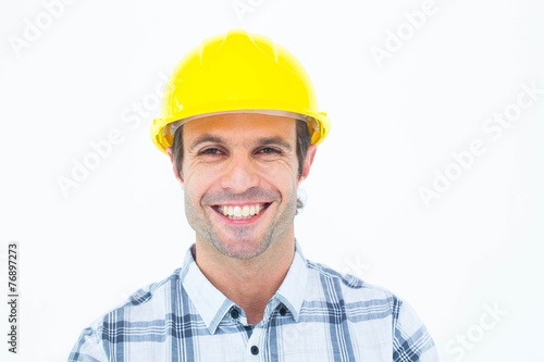 Architect wearing hardhat over white background