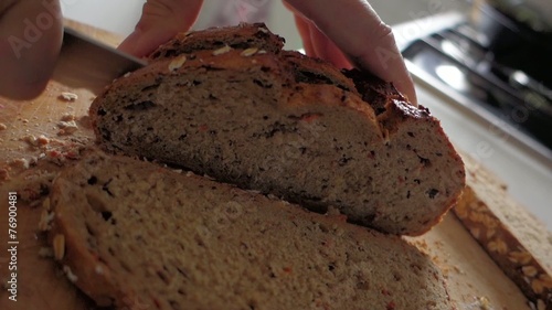 Bread - man cut slice with knife