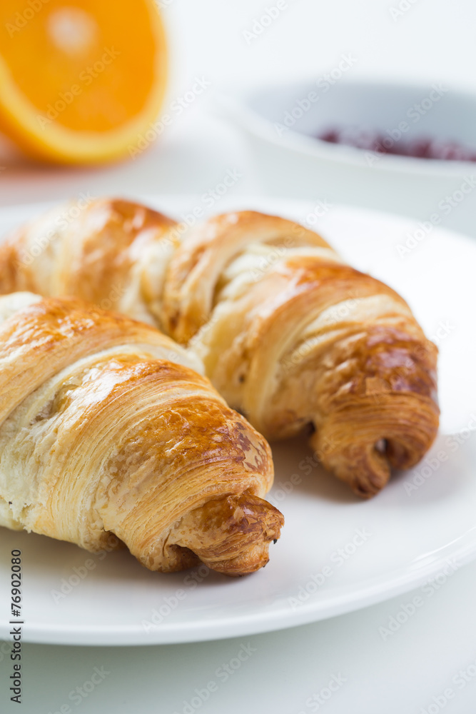 delicious breakfast with croissants and juice