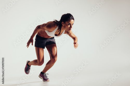 Energetic young woman running
