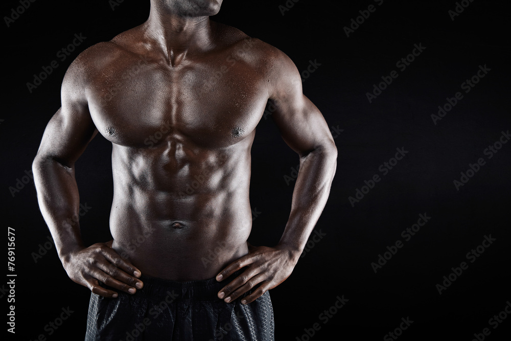 Torso of a muscular man with copyspace