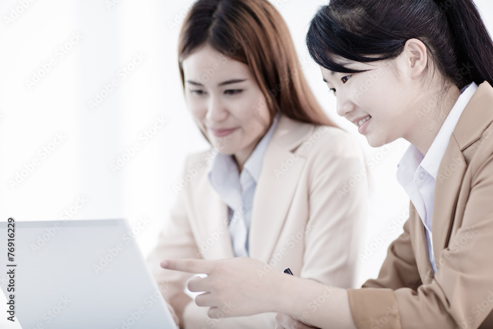Business people discussing the charts and graphs showing the res Business people discussing the charts and graphs showing the res