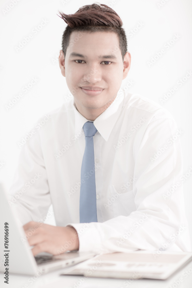 young asian businessman working in office young asian businessman working in office