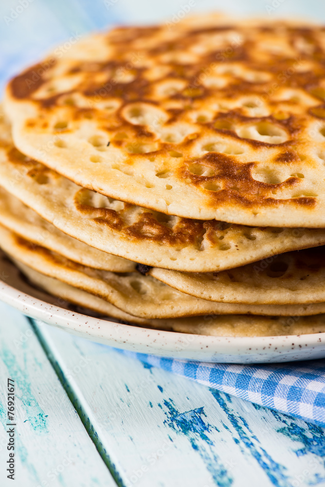 stack of pancakes on rustic wooden table stack of pancakes on rustic wooden table