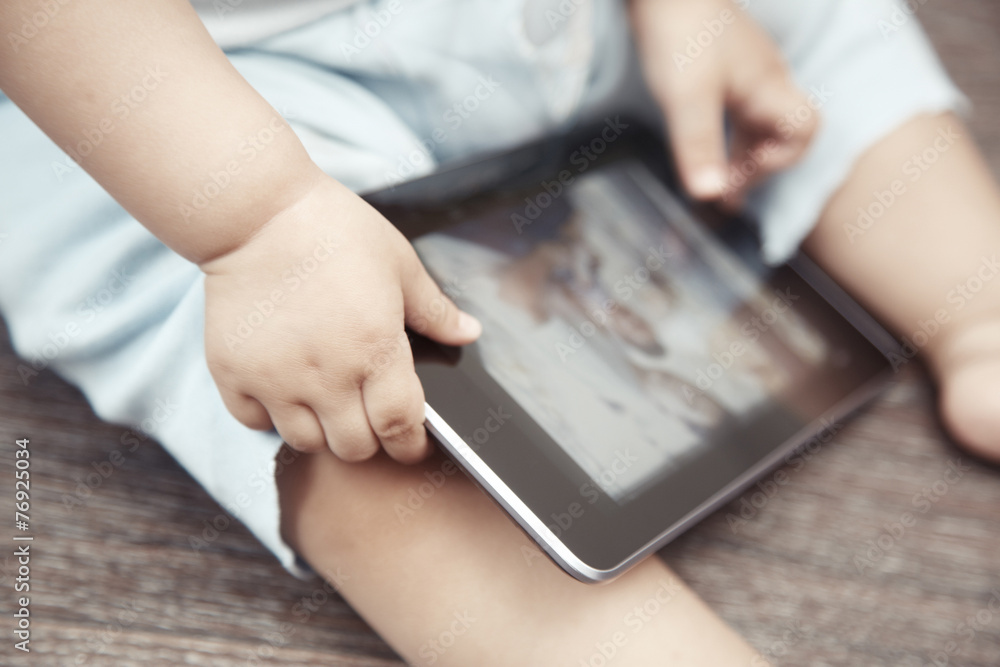 Baby with tablet computer Baby with tablet computer