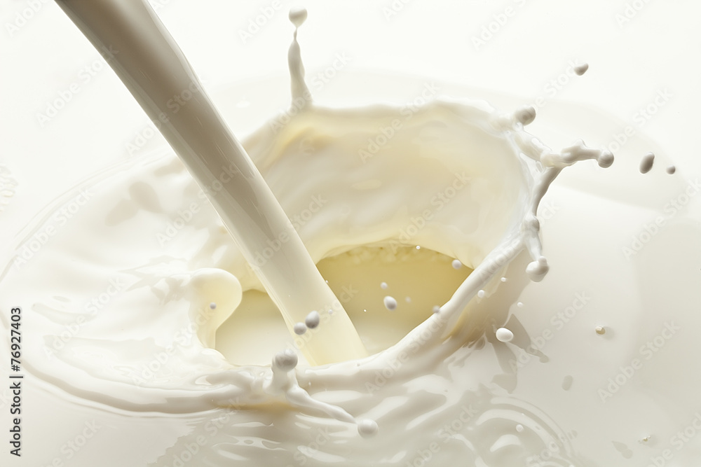Splash of milk photo. Closeup. - obrazy, fototapety, plakaty 