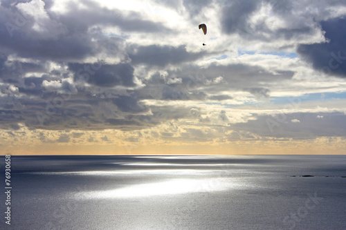 paraglider at dusk