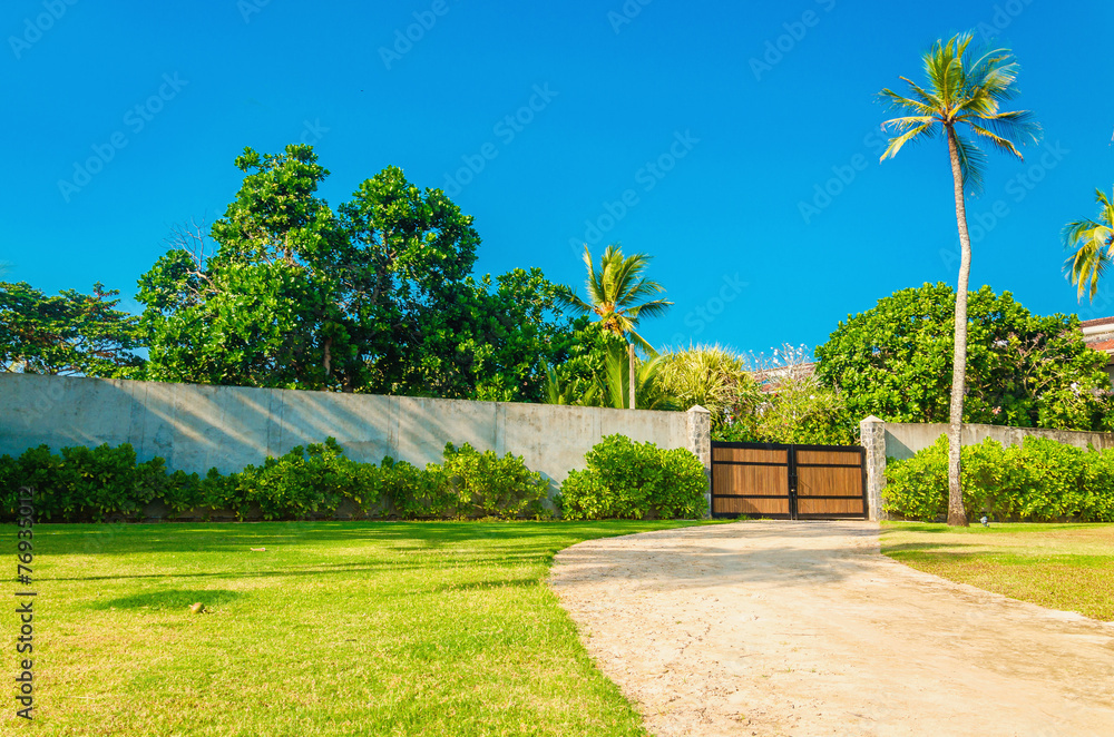 Wooden entrance of a uxury properties in exotic scenery