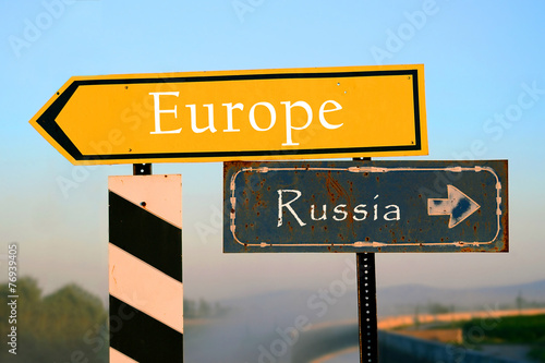 Europe and russia signpost. international relations metaphore © matimix