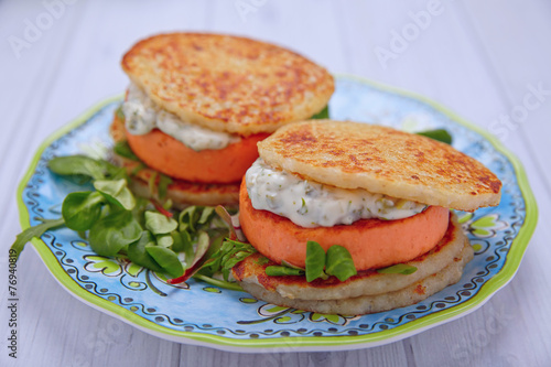 Salmon burger with potato pancakes