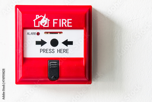 fire alarm box on cement wall
