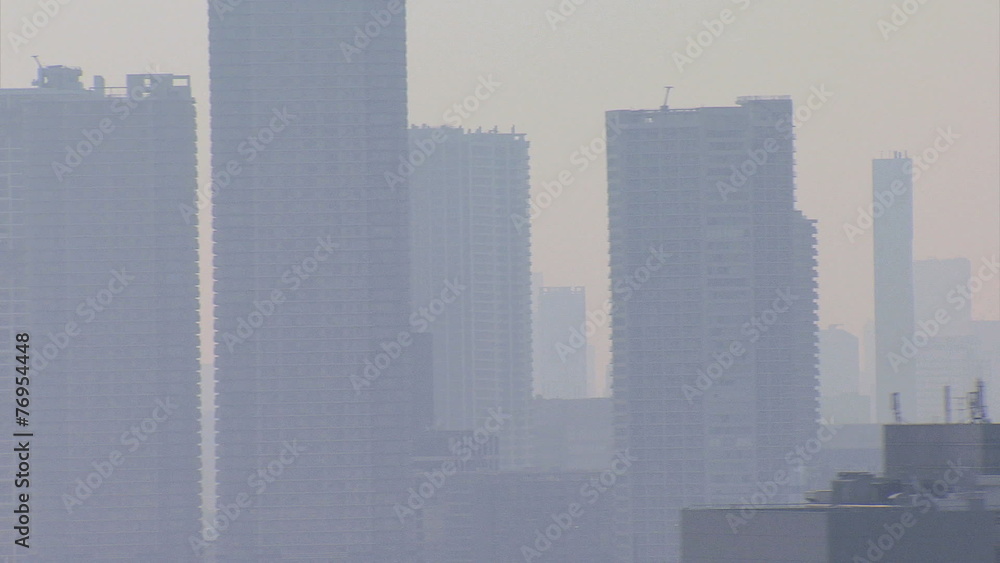 Aerial close up Tokyo city smog air pollution climate Japan Asia Aerial close up Tokyo city smog air pollution climate Japan Asia