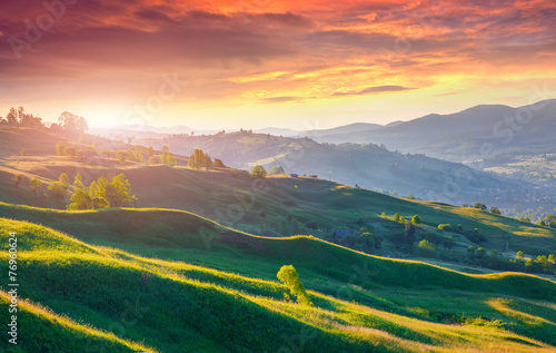 Dramatic summer sunrise in the mountains