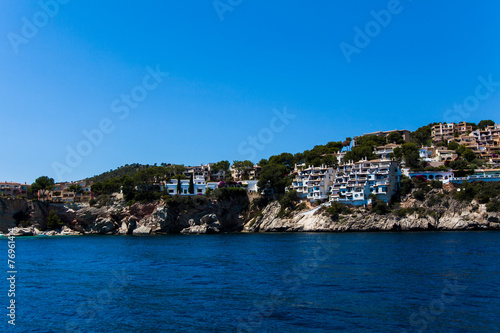 Apartment buildings by Mediterranean Sea. view of Mallorca coas