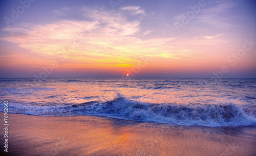 Fototapeta Naklejka Na Ścianę i Meble -  Sunset Twilight Dusk Beach Wave San Concept