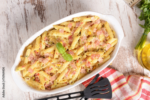 Penne pasta casserole with cheese, ham and corn