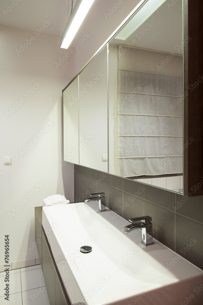 Double porcelain sink in bathroom Double porcelain sink in bathroom
