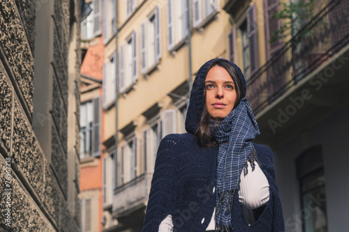 Beautiful girl posing in the city streets