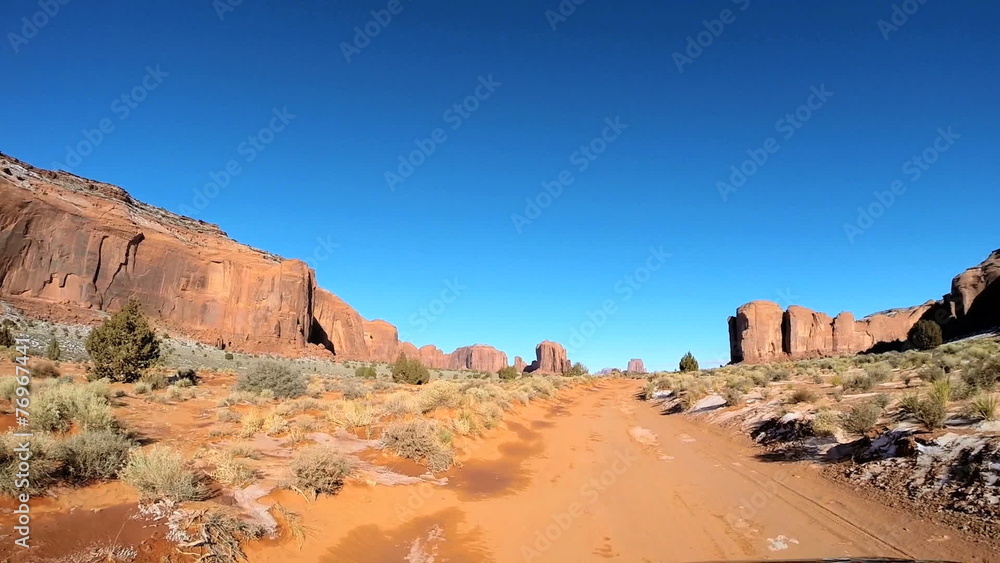 POV driving road trip Monument Valley winter landscape snow Arizona USA POV driving road trip Monument Valley winter landscape snow Arizona USA