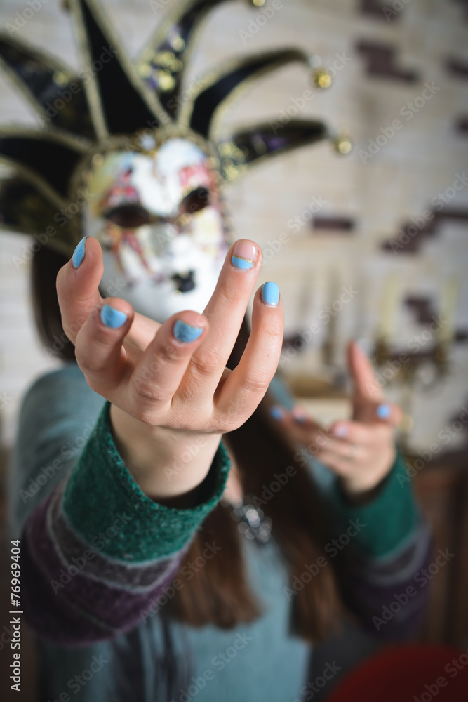 Fototapeta premium Venetian mask with woman face and hands