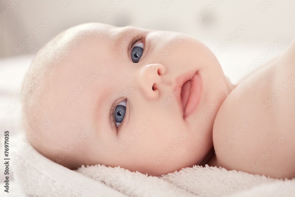 Adorable baby face with blue eyes Adorable baby face with blue eyes