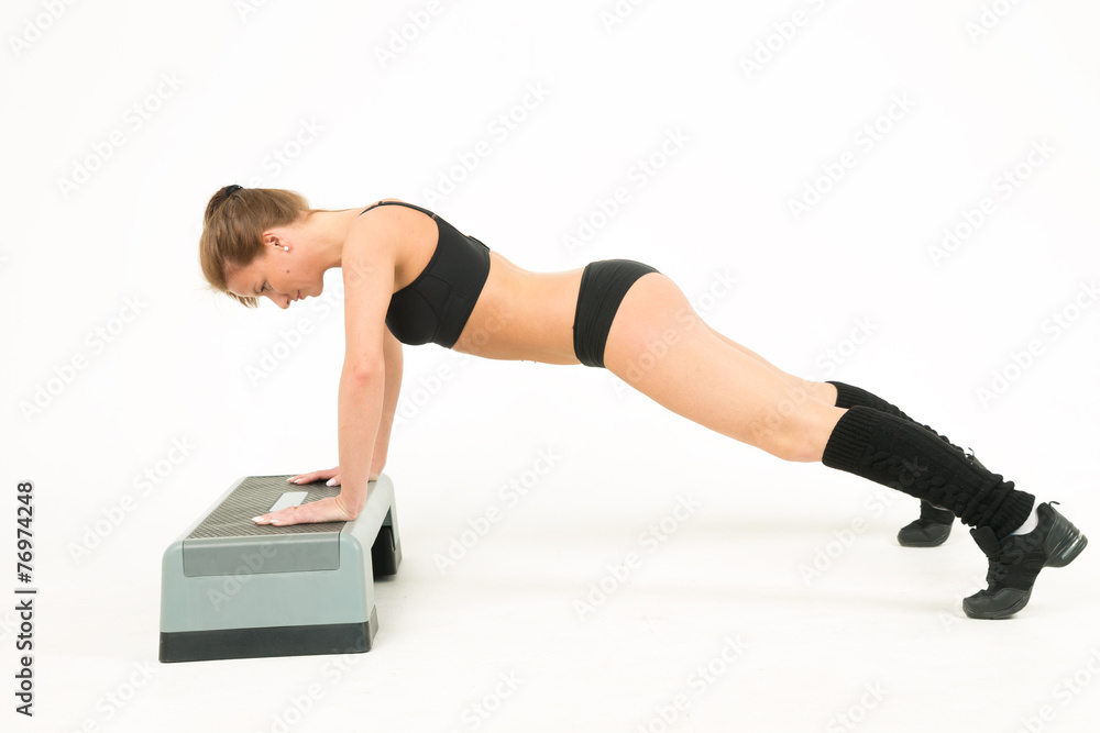 sport girl push-ups of step