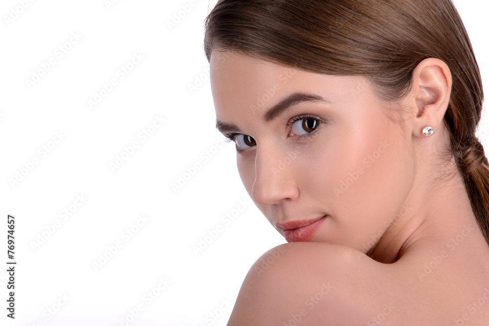 Naklejka premium Young beautiful girl posing on white background