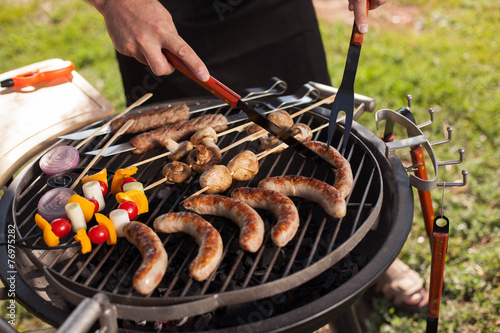 Fresh meat and vegetables on outdoor grill