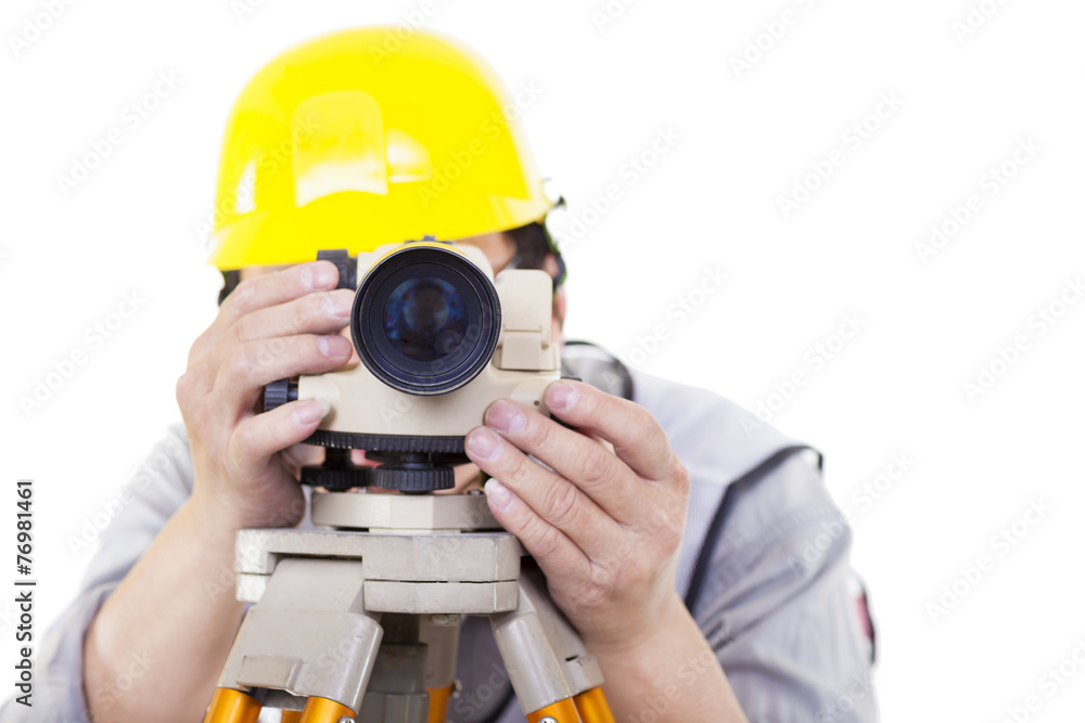 Surveyor worker making measurement and isolated on white Surveyor worker making measurement and isolated on white