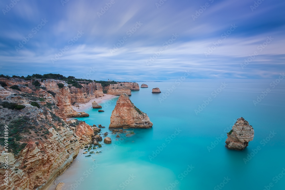 Beautiful seascape with unreal sky blue colors. Portugal,.
