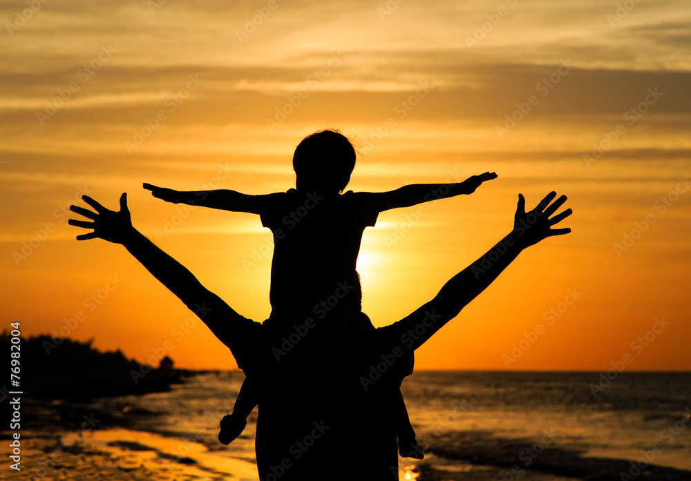 Fototapeta premium father and son having fun on sunset