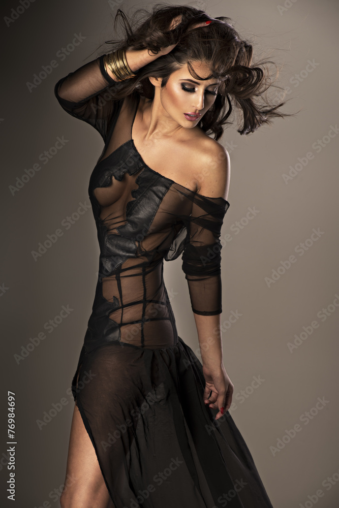 Fototapeta premium Cute woman in gorgeous dress