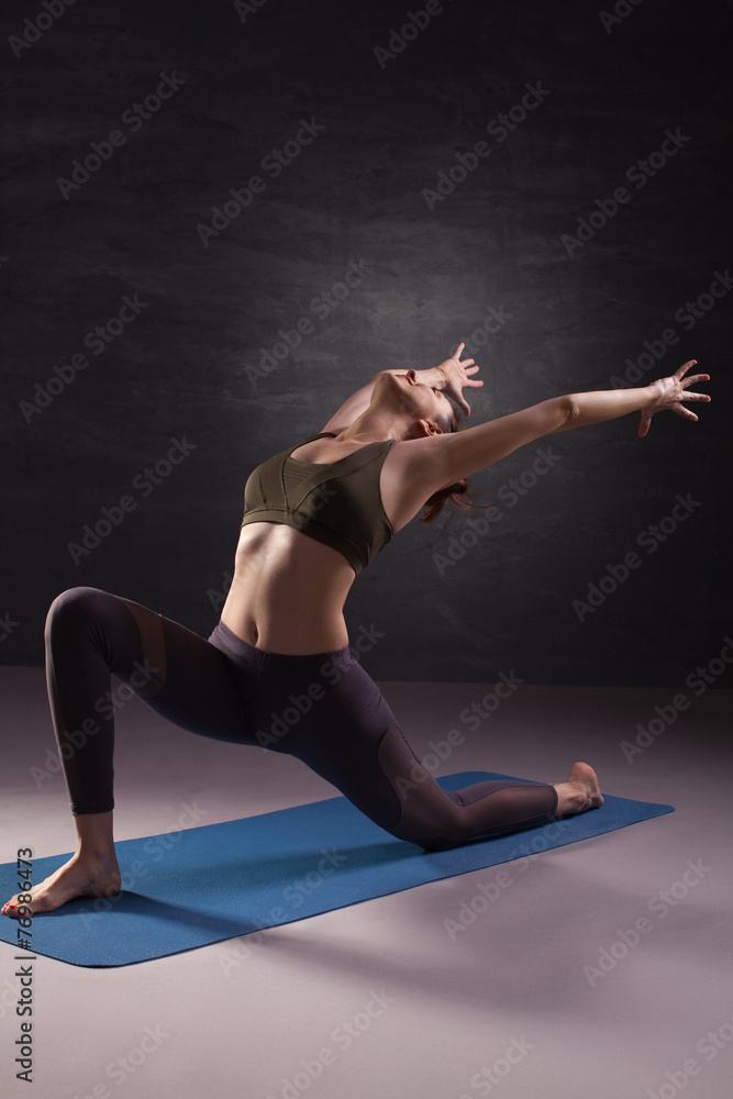 Mature woman practicing yoga