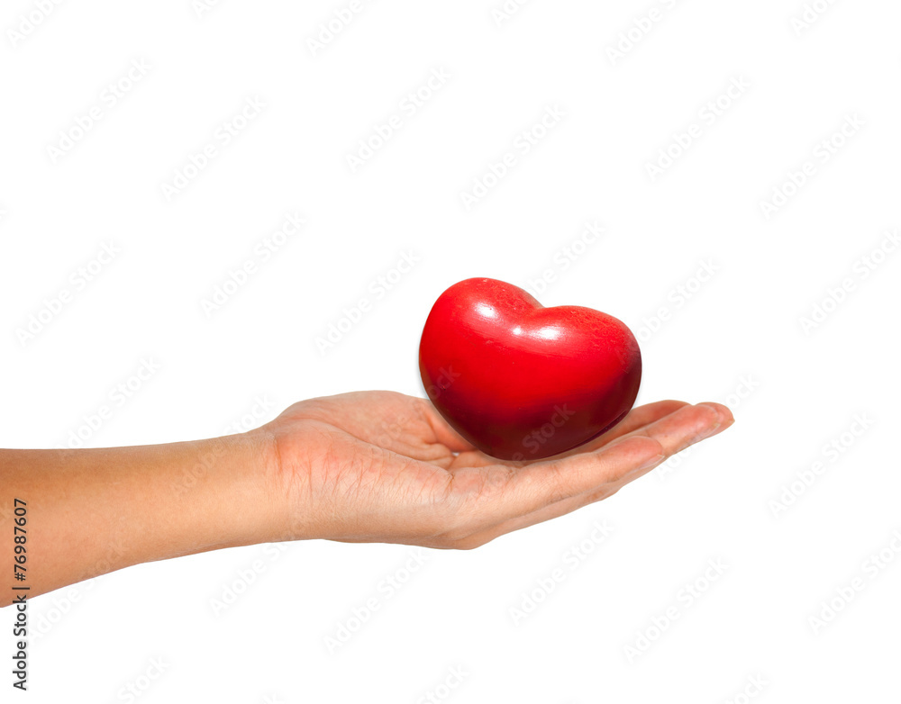 Red Heart in female hand Red Heart in female hand