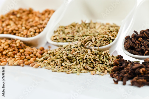 spices in small ceramic cups