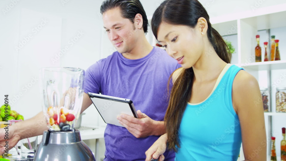 Asian Chinese Couple Tablet Healthy Homemade Fruit Smoothie Asian Chinese Couple Tablet Healthy Homemade Fruit Smoothie
