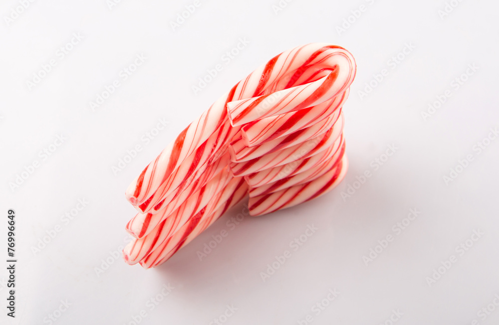 Mint Christmas colors candy cane over white background Mint Christmas colors candy cane over white background