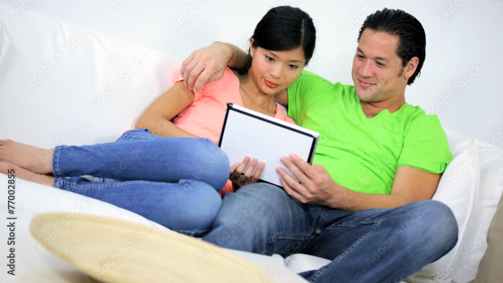 Ethnic Male Female Social Networking Relaxing Home Couch Ethnic Male Female Social Networking Relaxing Home Couch