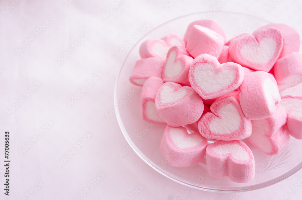 Pink heart marshmallow in glass dish Pink heart marshmallow in glass dish